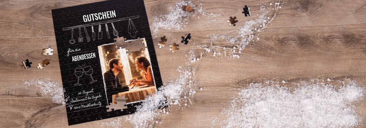 Gutschein für ein Abendessen als Puzzle