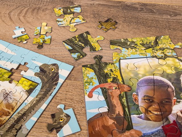 Größenvergleich der Puzzleteile vom Fotopuzzle mit 100 Teilen und Fotopuzzle mit 48 Teilen